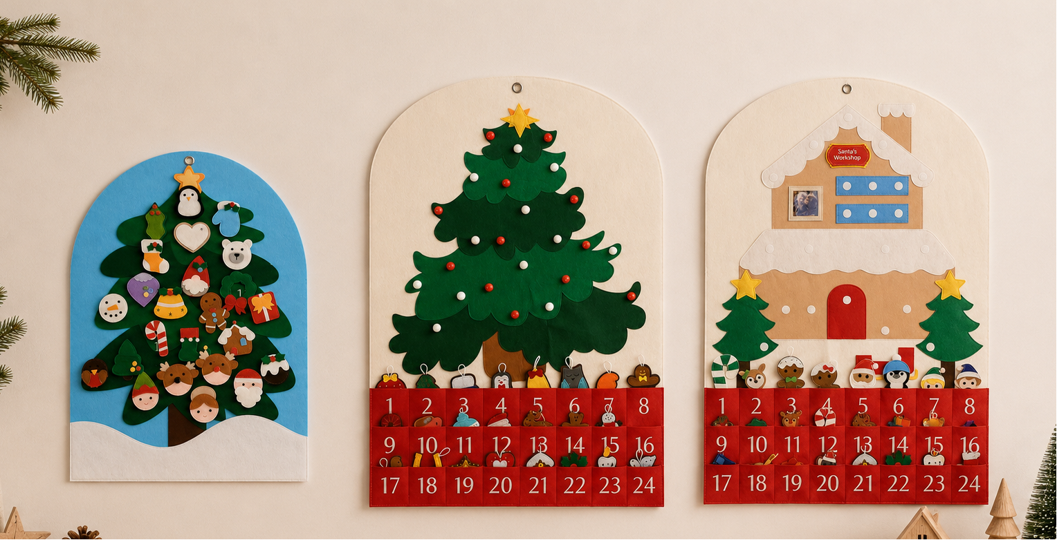 Three festive Christmas advent calendar wall pieces displayed side by side on a light beige wall above a wooden surface. The left piece shows a decorated Christmas tree with animal ornaments on a blue background; the middle shows a green Christmas tree with a red numbered advent section below; the right shows a snowy house with small trees and a red numbered advent section below.