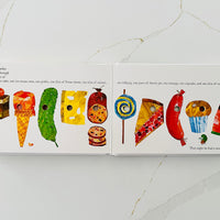 Das Pappbuch „Very Hungry Caterpillar“ von Eric Carle