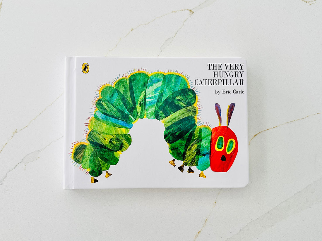 Das Pappbuch „Very Hungry Caterpillar“ von Eric Carle