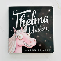 كتاب Thelma the Unicorn Board من تأليف آرون بلابي